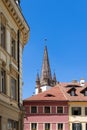 Lutheran Cathedral of Saint Mary Biserica Evanghelica, and iconic eyebrow dormers of Eyes of Sibiu Royalty Free Stock Photo