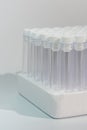 Vertical photo of empty vacuum blood test tubes in laboratory Royalty Free Stock Photo