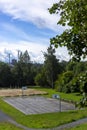 Basketball and volleyball courts in city park without people at isolation time Royalty Free Stock Photo