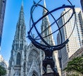 Vertical photo of the giant Atlas holding the planet earth as punishment of the gods, on the fifth avenue of the big apple in