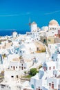 Vertical photo of houses in Santorini, Greece