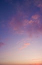 Vertical photo of majestic colorful clouds in pastel tones. Sky and beautiful clouds, heaven.