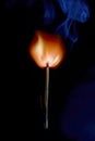 Safety match on black background with flaming head Royalty Free Stock Photo