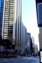 Vertical photo of multistory buildings on the street of Sydney