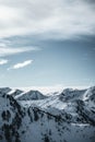 Vertical photo of Nocky mountains in austrian Alps. White peaks in back light during sunset. Royalty Free Stock Photo