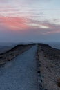 Vertical photo road to beautiful infifnite sunrise over holy land in Israe