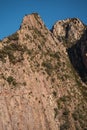 Vertical photo of rocky formations on a mountain