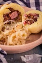 Detail of fresh dumplings filled by smoked meat with cabbage Royalty Free Stock Photo