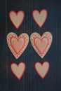 Vertical photograph of cardboard hearts