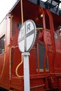 Railroad Sign and Red Caboose taken late in the Day Royalty Free Stock Photo