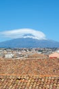 Vertical photography capturing beautiful cityscape of Catania, Sicily, Italy with famous Mount Etna volcano in background Royalty Free Stock Photo