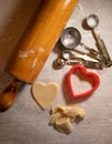 Heart Shaped Cookie Cutter with Cookie Dough and Baking Items Royalty Free Stock Photo