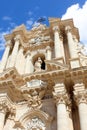 Vertical picture capturing historical Roman Catholic Cathedral of Syracuse in Sicily, Italy on a sunny day