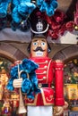 Vertical picture of christmas decoration on new year market in Alsace, France. Nutcracker and a lot of blue and red bears. Colmar Royalty Free Stock Photo