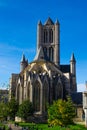 Vertical Picture Of The Facade Of Saint Nicholas` Church Sint-Niklaaskerk In A Sunny Day With Green Trees Of Emile Braunplein A