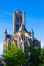 Vertical Picture Of The Facade Of Saint Nicholas` Church Sint-Niklaaskerk In A Sunny Day With Green Trees Of Emile Braunplein A