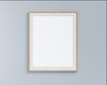 Vertical picture frame mock up hanging on pastel painted wall. 3D render.