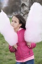 Vertical picture of a girl with cotton candy