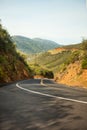 Vertical picture of mountain road in Yosemite national park, California, USA with hills around in sunny summer day. Yosemite Royalty Free Stock Photo