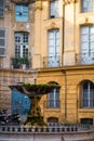 Vertical picture of old fountain on the 17th century Albertas square in Aix-en-Provence, France. Travel tourism destination Royalty Free Stock Photo