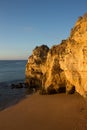 Vertical picture of a rock on the Algarve beach, Portugal Royalty Free Stock Photo