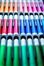 Vertical picture soft focus close-up of palette of colored markers in box with plastic insert. Colored drawing markers in a Royalty Free Stock Photo