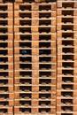 Stacks of wooden cargo shipping pallets. Royalty Free Stock Photo