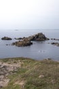 Vertical picturesque view of the rocky shore of Quiberon, France