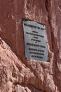 Vertical of the plaque of the Garden of the Gods on a rock, Colorado Springs, USA