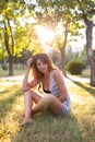 Vertical portrait against the background of nature of a beautiful leggy twenty five year old woman Royalty Free Stock Photo