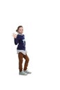 The vertical portrait of a beautiful teenage girl gesturing thumbs-up on white background Royalty Free Stock Photo