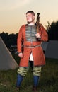 Vertical portrait in full growth of the Slavic soldiers in historic costume