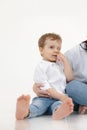 Vertical portrait of sad, crying little kid, boy with close eye. Bad and negative emotions, stress and upsetting child Royalty Free Stock Photo