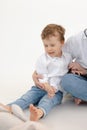 Vertical portrait of sad, crying little kid, boy with close eyes. Bad and negative emotions, stress and violence of kids Royalty Free Stock Photo