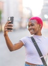 Vertical portrait of a young afro woman taking a selfie Royalty Free Stock Photo