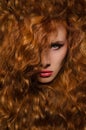 Vertical portrait of woman with red hair