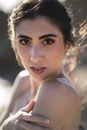 Vertical portrait of a young caucasian brunette female with dark brown eyes Royalty Free Stock Photo