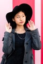 Vertical portrait of a young classy asian girl Royalty Free Stock Photo