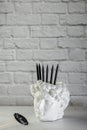 Vertical position. Chalk lettering School. David`s head plaster stand for office, creative and school supplies on a light