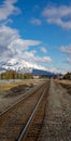 Vertical of railway tracks leading to the Three Sisters Canmore Canadian Rockies