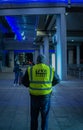 Vertical rear shot of a taxi driver in the Manchester Airport, United Kingdom