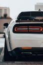 Vertical rear view of a Dodge Hellcat supercar with orange breaks