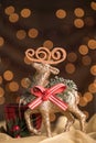 Vertical Reindeer Ornament Christmas Bokeh Background. Selective Royalty Free Stock Photo