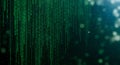 Vertical rows of green binary code cascade against a dark background, resembling a Royalty Free Stock Photo