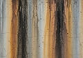 Vertical rust and stain streaks on a weathered concrete wall create Royalty Free Stock Photo