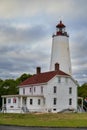 Vertical of Sandy Hook Lighthouse in New Jersey on a cloudy day Royalty Free Stock Photo