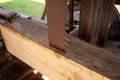 Vertical saw blade cuts lumber in a colonial sawmill Royalty Free Stock Photo