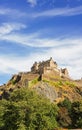 Vertical scenic view of the famous Edinburgh castle on a hill on a sunny day