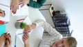 Vertical Screen: college students having teamwork practice at table.