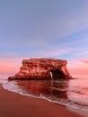 Vertical seascape of stunning natural arch stone on the Pacific Coast Royalty Free Stock Photo